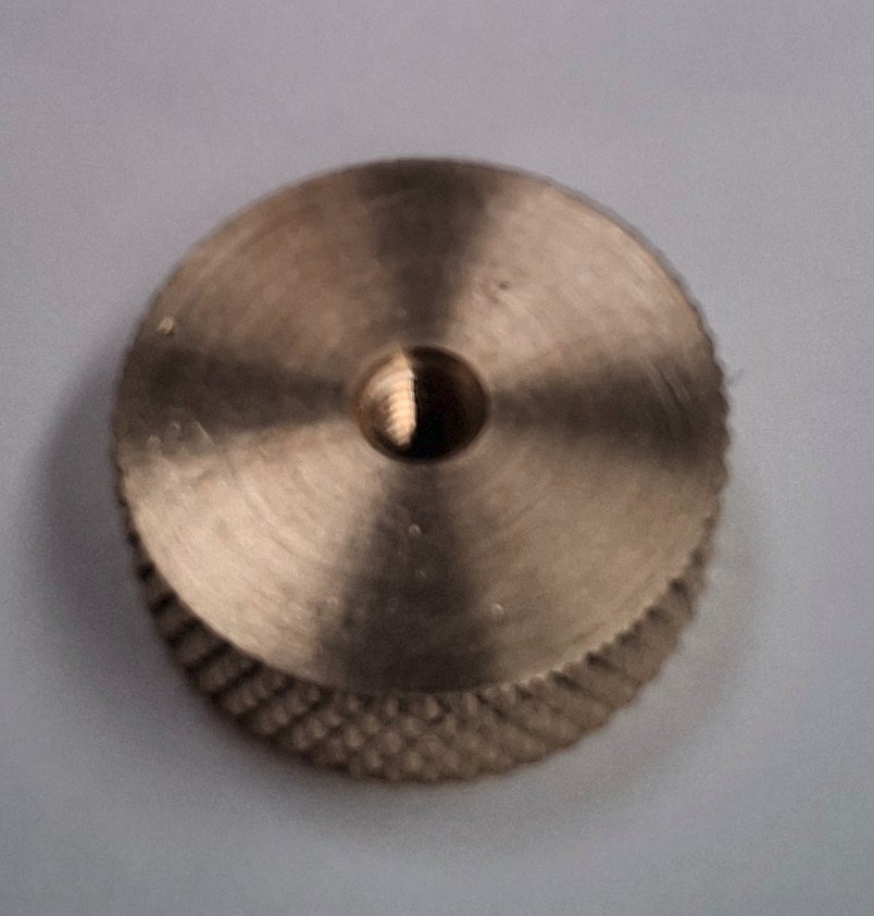 Decorative brass wheel nut